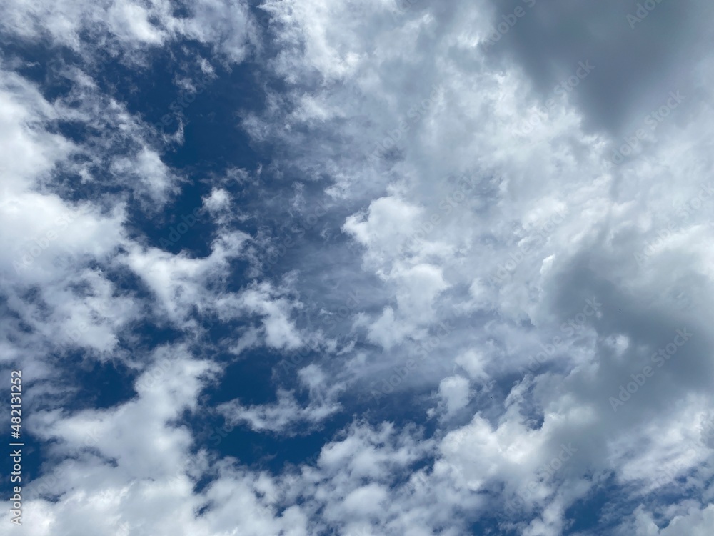 Broken white clouds on a blue sky. Broken white clouds on a blue sky.