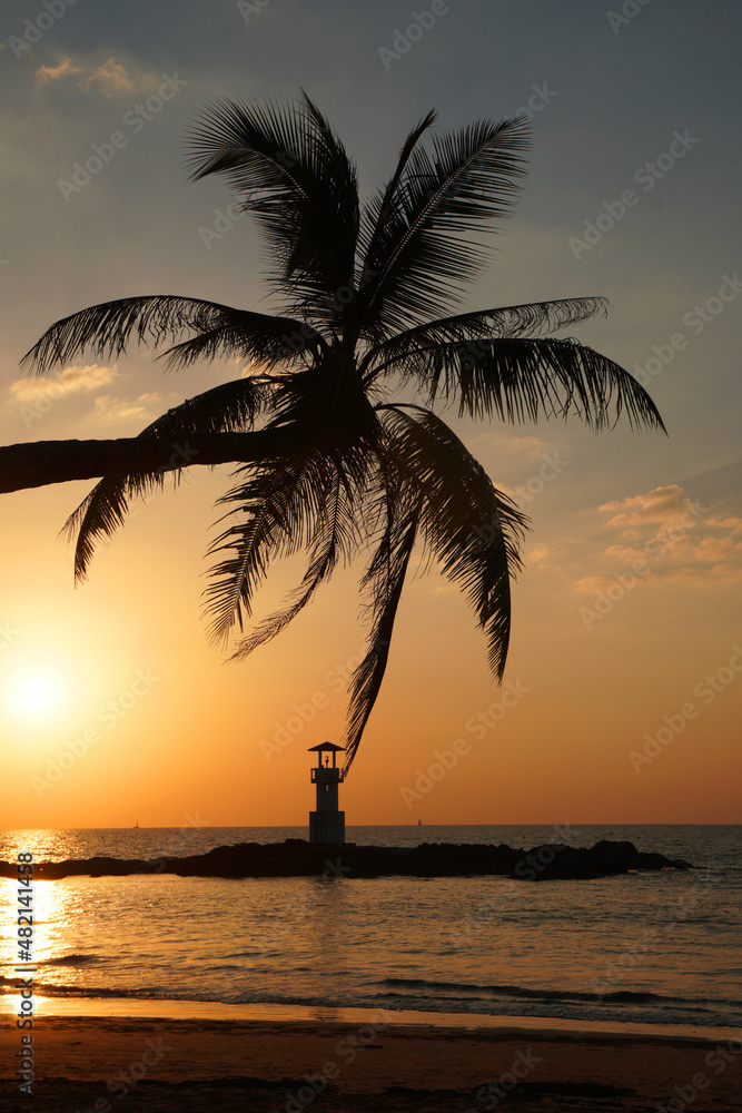 Landscape nature sunset and red  twilight sky with Silhouette  lighthouse coconut tree at Nang Thong Beach at Khao Lak Phang Nga Thailand - Seascape chill vibe on the beach - beautiful sky  