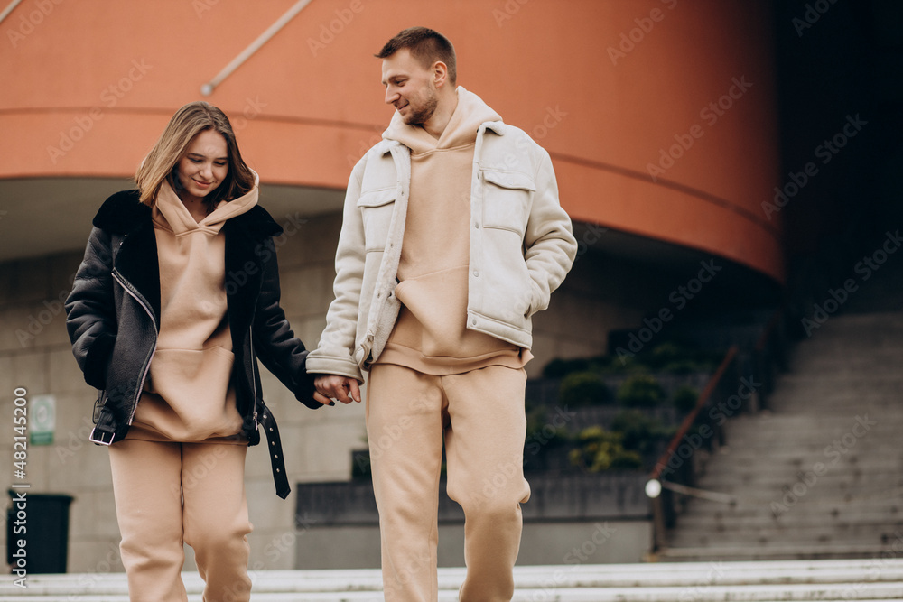 Couple walking together in city