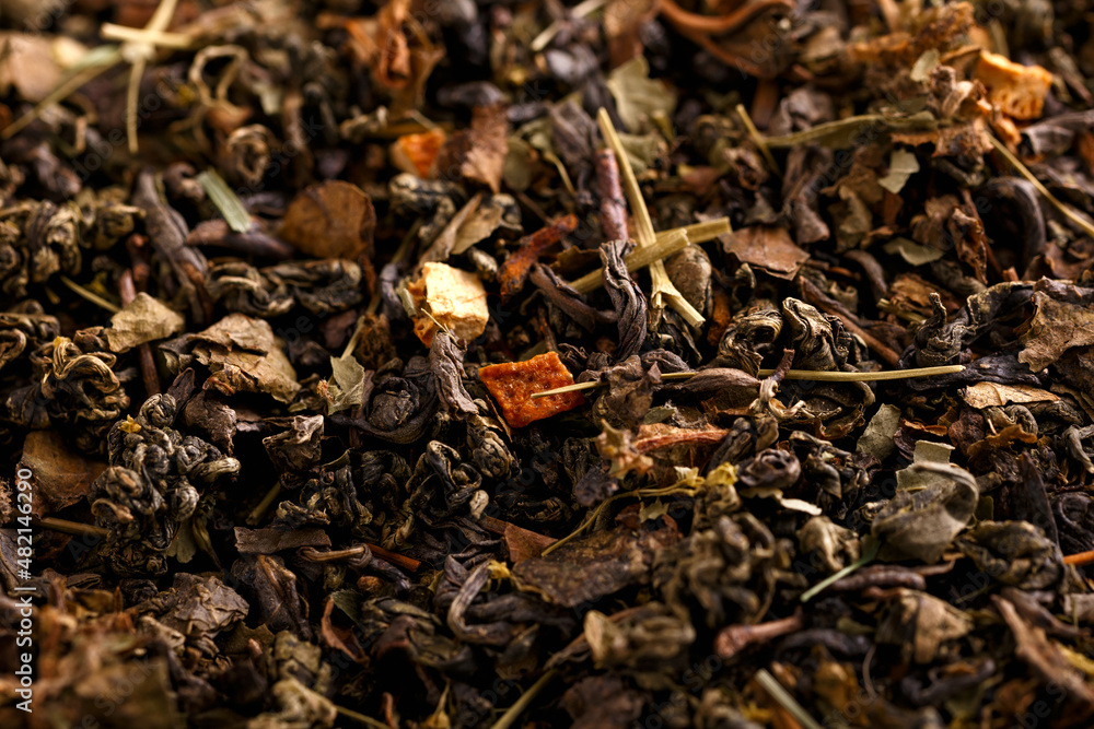 Dry green leaf tea mix. Background, texture Dry green leaf tea mix. Background, texture
