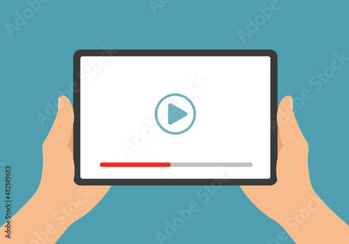 Flat design illustration of male hands holding digital tablet with touch screen and play button. Watching video or movie on white display, vector