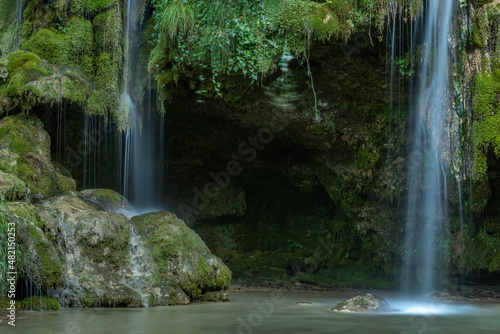 Fototapeta Naklejka Na Ścianę i Meble -  Tuff waterfalls at the source of the Cuisance river near Arbois.
