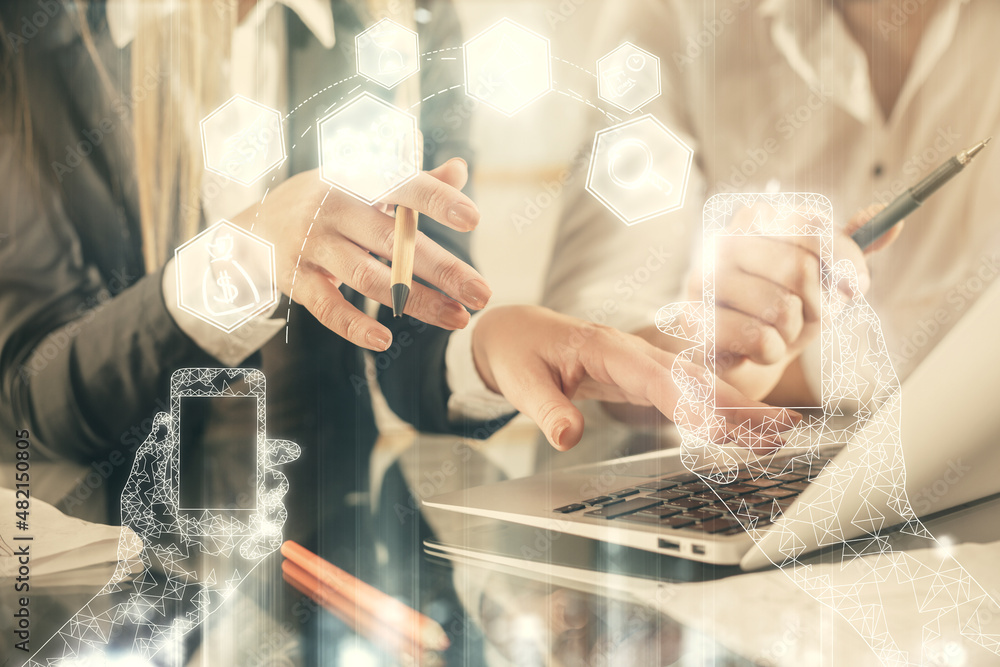 Double exposure of man and woman working together and tech hologram drawing. Technology concept. Computer background.