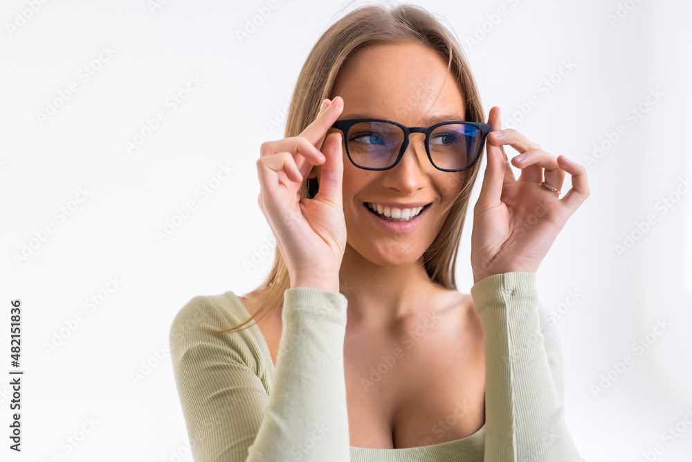 Glasses optician showing eyewear. Closeup of glasses, with glasses and frame in focus. Woman optometrist on white background.
