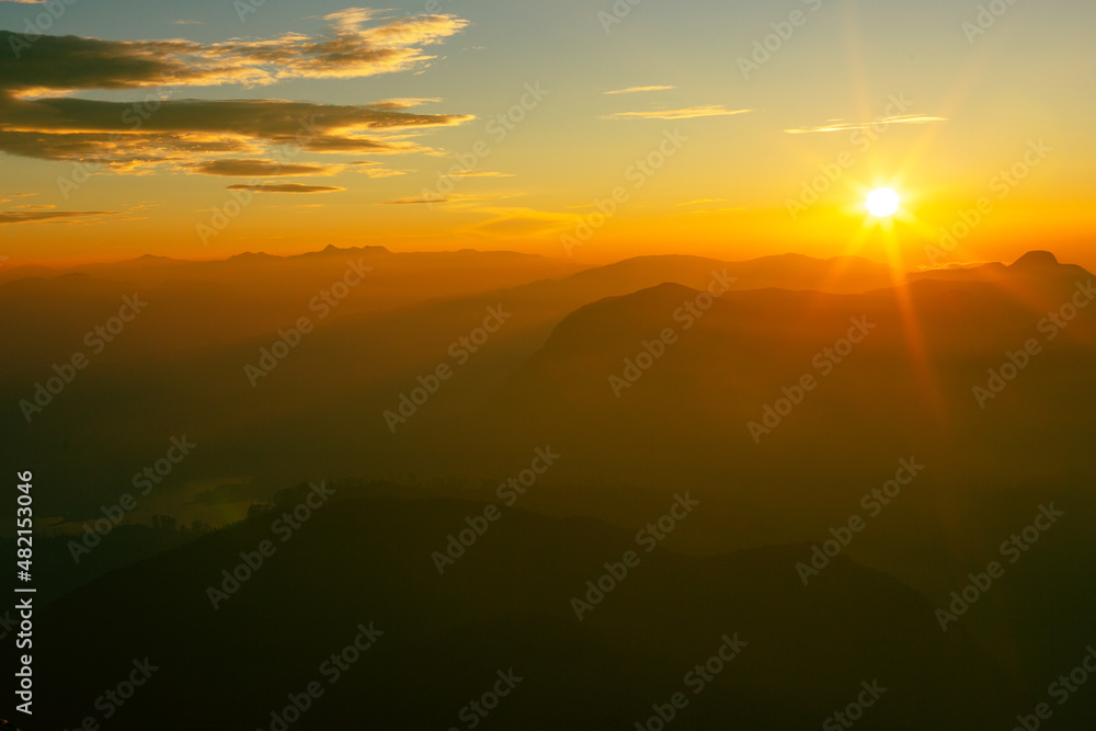 Valley view with villages and mountains at sunrise. View from Adam's peak, Sri Lanka