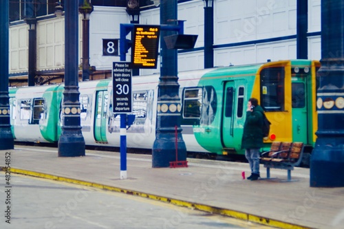 train arriving at railway station in the city