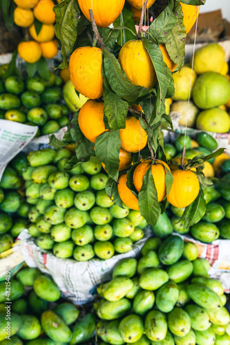 Fototapeta Naklejka Na Ścianę i Meble -  Sri Lanka Bazaar. Tropical fruits and vegetables in outdoor market in Sri Lanka. 