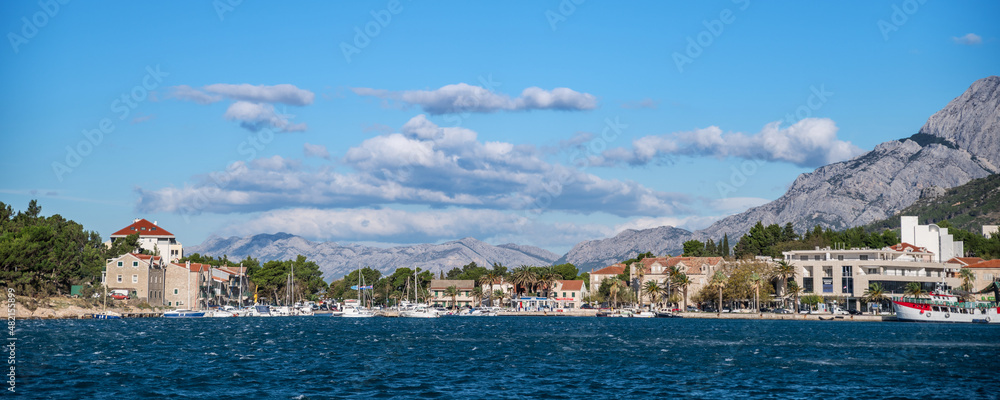 Beautiful seaside landscape of Croatia coastline.  Transparent sea and bright sky.