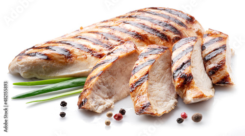 Grilled chicken fillet with herbs isolated on white background.