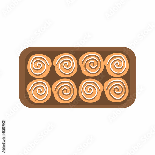 Cinnamon bun. Sweet roll with sugar glaze and chocolate on dish, isolated on white background. Top view. 