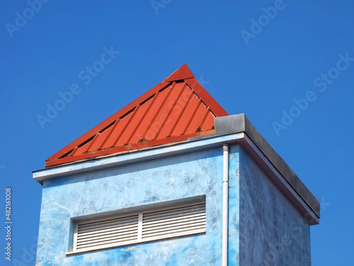 Colorful striped wooden beach houses at the promenade of Costa Nova, Aveiro, Portugal