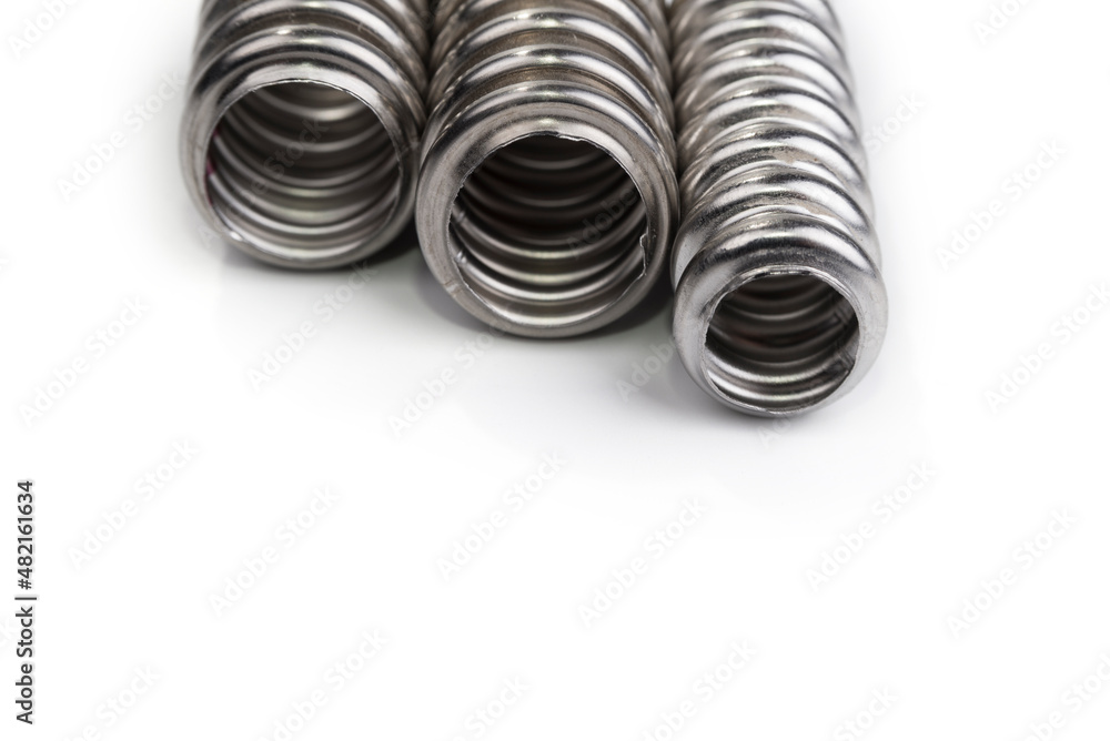 Steel flexible hoses for a boiler on a white Steel flexible hoses for a boiler on a white