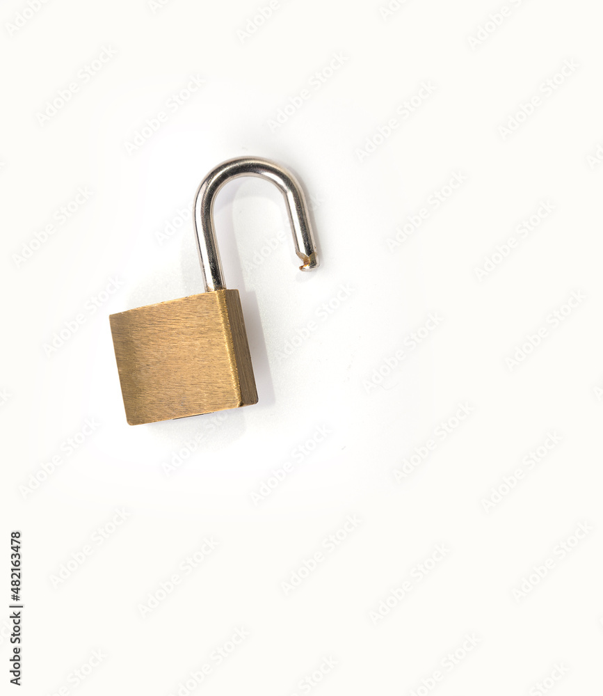 Small travel padlock on the suitcase on a white Small travel padlock on the suitcase on a white