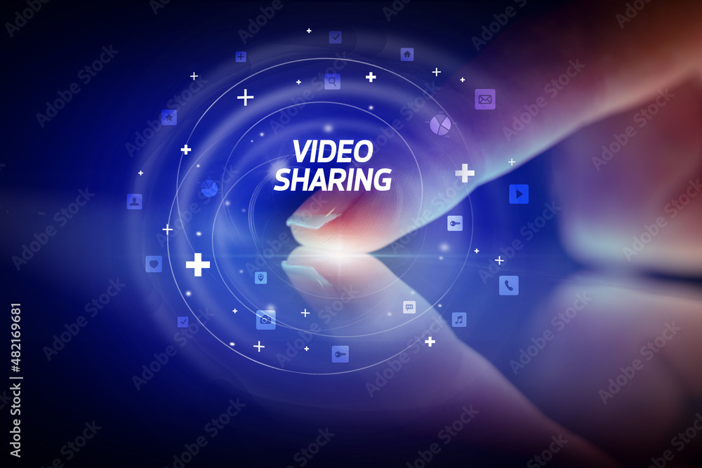 Fototapeta premium Finger touching tablet with social media icons concept