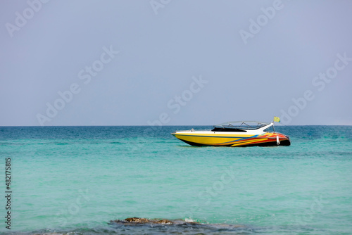 Fototapeta Naklejka Na Ścianę i Meble -  Clear Blue sea on island beach with travel speed boat service