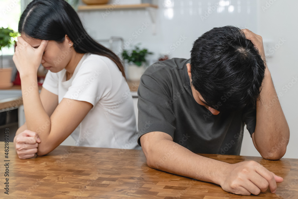 Quarrel couple concept. Asian Wife and husband sad after argue. Quarrel couple concept. Asian Wife and husband sad after argue.
