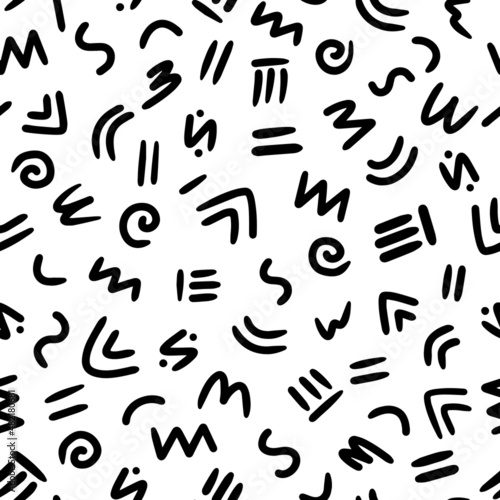 Stylized seamless african pattern with abstract shapes. Hand drawn brush stroke tribal and ethnic background. Black and white native symbols. Vector illustration