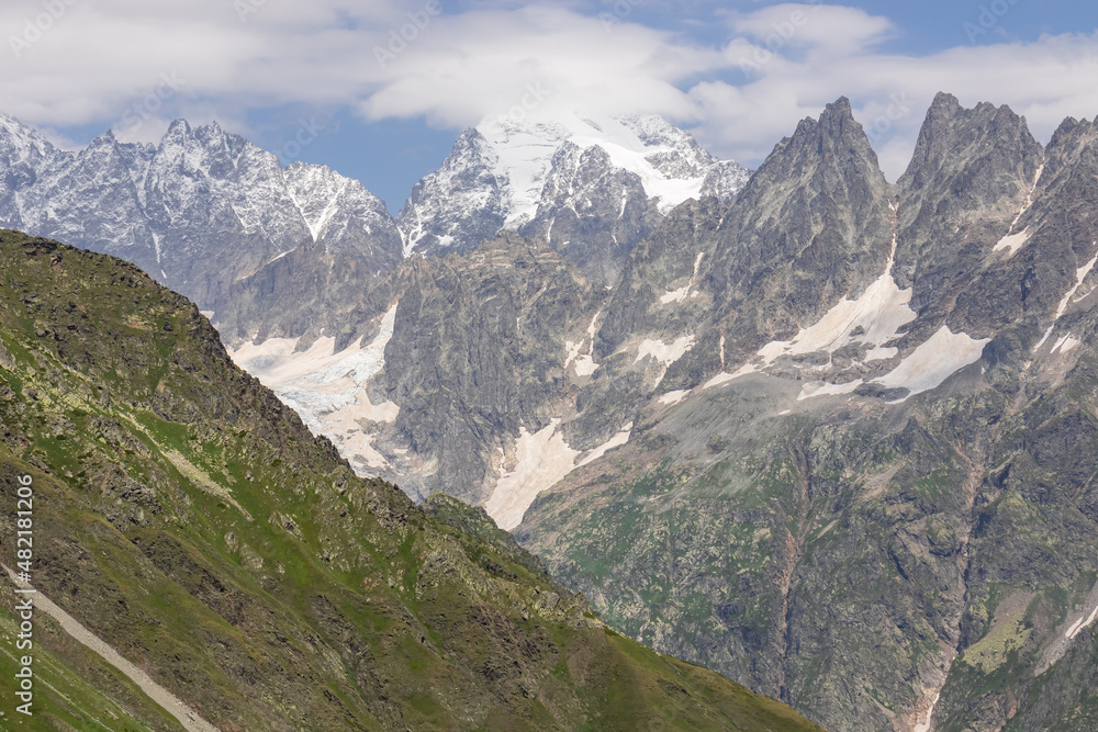 An amazing panoramic view on the mountain ridges near Mestia in the Greater Caucasus Mountain Range, Samegrelo-Upper Svaneti, Country of Georgia. View on Chalaadi Glacier. Wanderlust