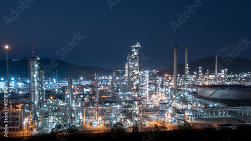 Chemical industry storage tank and oil refinery in Industrial Plant at night over lighting  Fuel and power generation  petrochemical factory industry zone