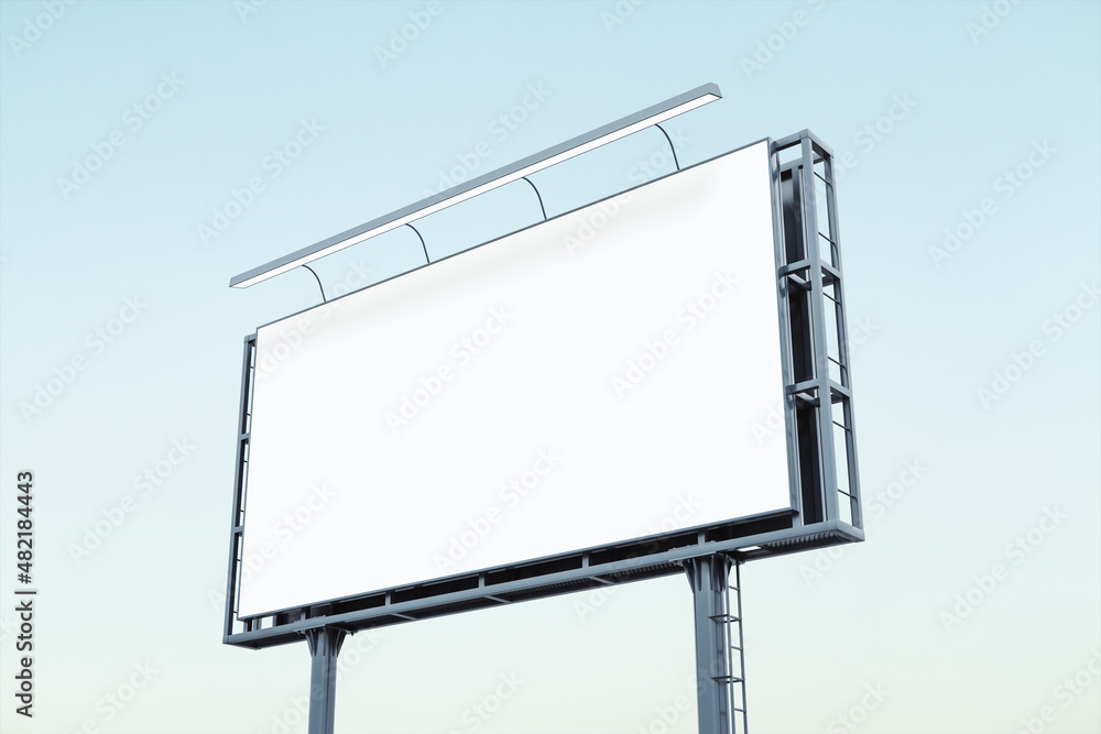 Blank white billboard on blue sky background at sunset, perspective view. Mockup, advertising concept Blank white billboard on blue sky background at sunset, perspective view. Mockup, advertising concept
