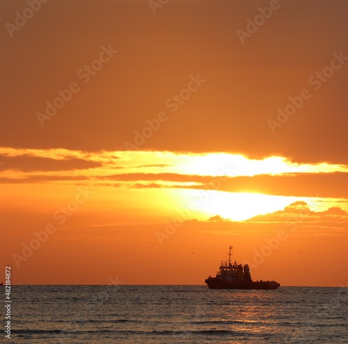 mud dredgers boat at sunset © Abdul Rahman