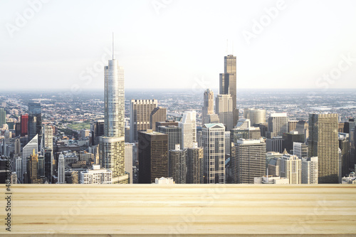 Blank table top made of wooden planks with beautiful Chicago cityscape at daytime on background  mockup
