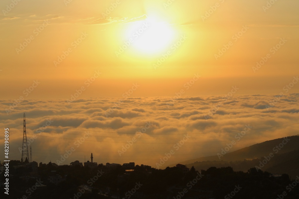 Naklejka premium sunrise over the city