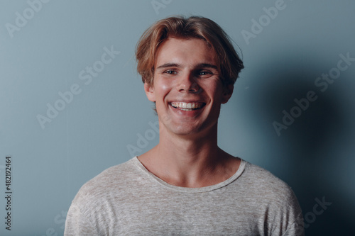 Portrait european young man portrait at studio in face mask