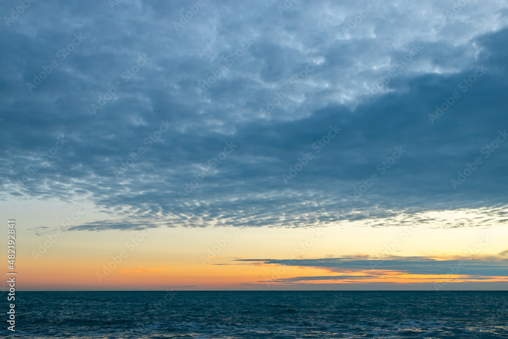seascape with evening sky and clouds