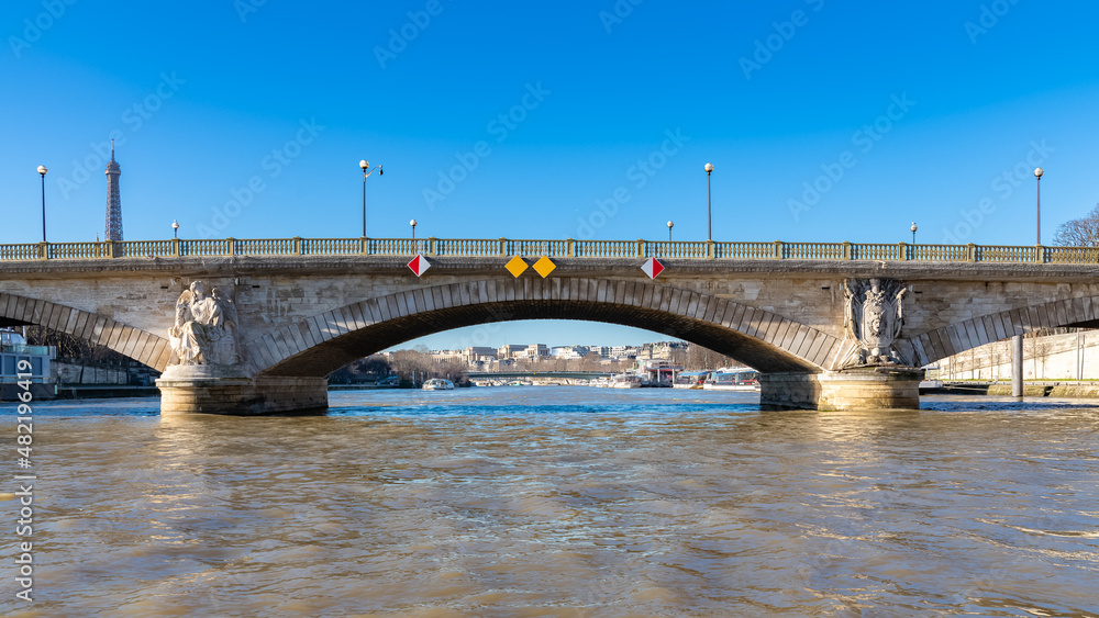  Paris, the Invalides bridge on the Seine, with the Eiffel Tower in background
