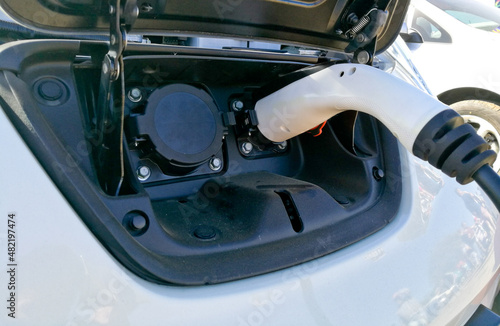 Charging adaptor of electronic vehicle engine white car