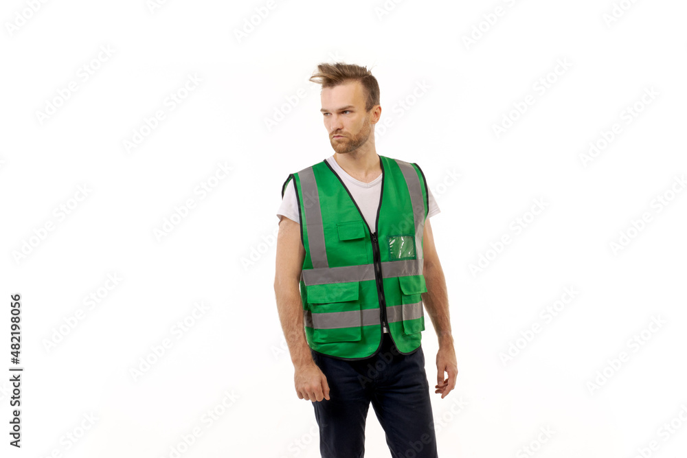 Adult man in uniform work vest standing on white background Adult man in uniform work vest standing on white background