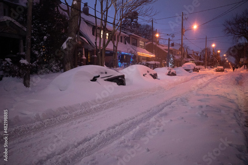 Toronto, Ontario / Canada - January 17, 2022 - Toronto St Clair West neighbourhood during bluehour on day of snowstorm © JW