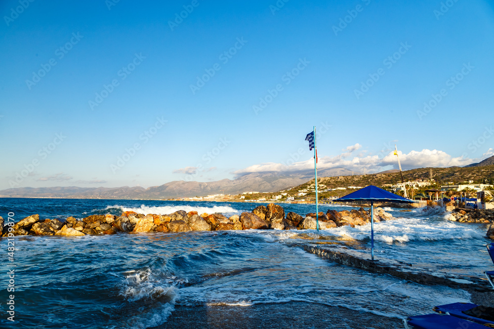 View of beautiful waves on coast of Mediterranean Sea. Greece.