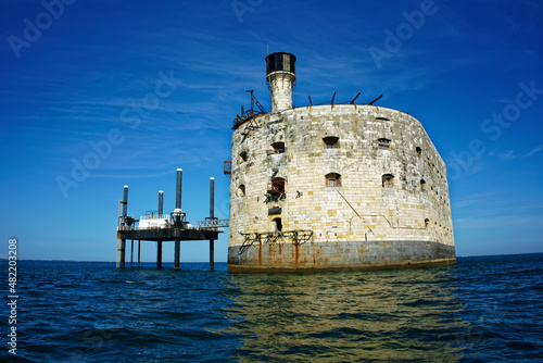 Fort boyard seen from the sea in front of a perfectly blue sky. Famous monument of Charente-Maritime in France. photo