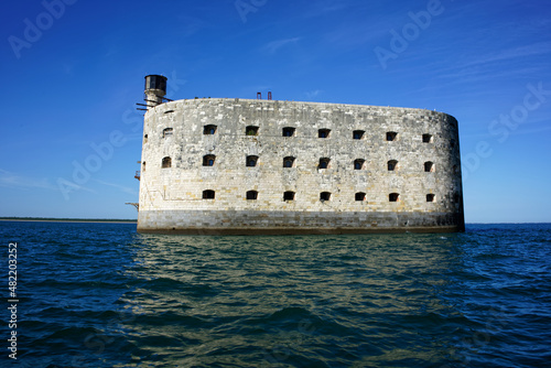 Fort boyard seen from the sea in front of a perfectly blue sky. Famous monument of Charente-Maritime in France.