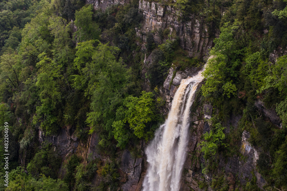 Spring sunset in Salt De Coromina waterfall, La Garrotxa, Spain Spring sunset in Salt De Coromina waterfall, La Garrotxa, Spain