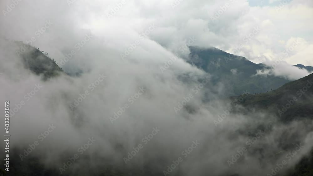 Low clouds move through the mountains of Myanmar (Burma) Low clouds move through the mountains of Myanmar (Burma)