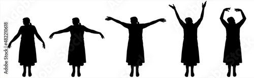 Dance lesson, ballet. Dance teacher in a dress. Hands in motion, legs without movement, standing still. Smooth, elegant, graceful hand movements. A group of women stands straight and moves their arms.