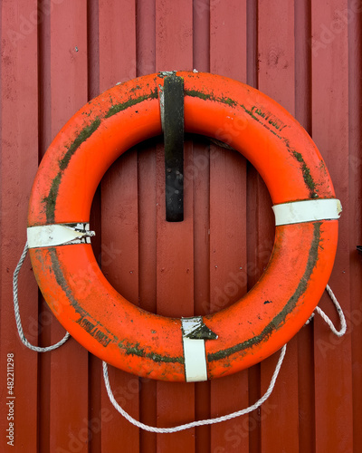 life buoy on wooden wall