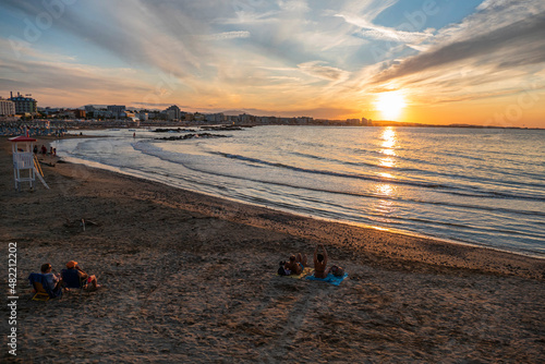 beautiful sunset with the sun setting over the sea in Cattolica