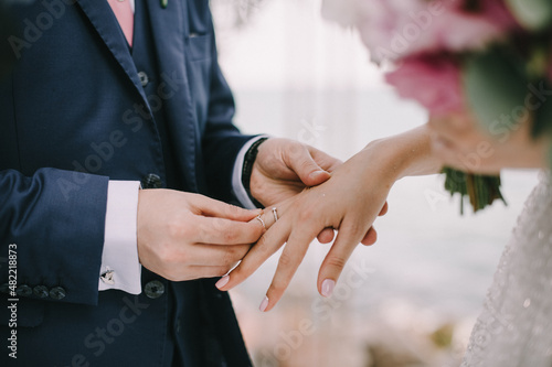 marriage, wedding ceremony, exchange of rings close-up