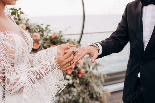 marriage, wedding ceremony, exchange of rings close-up