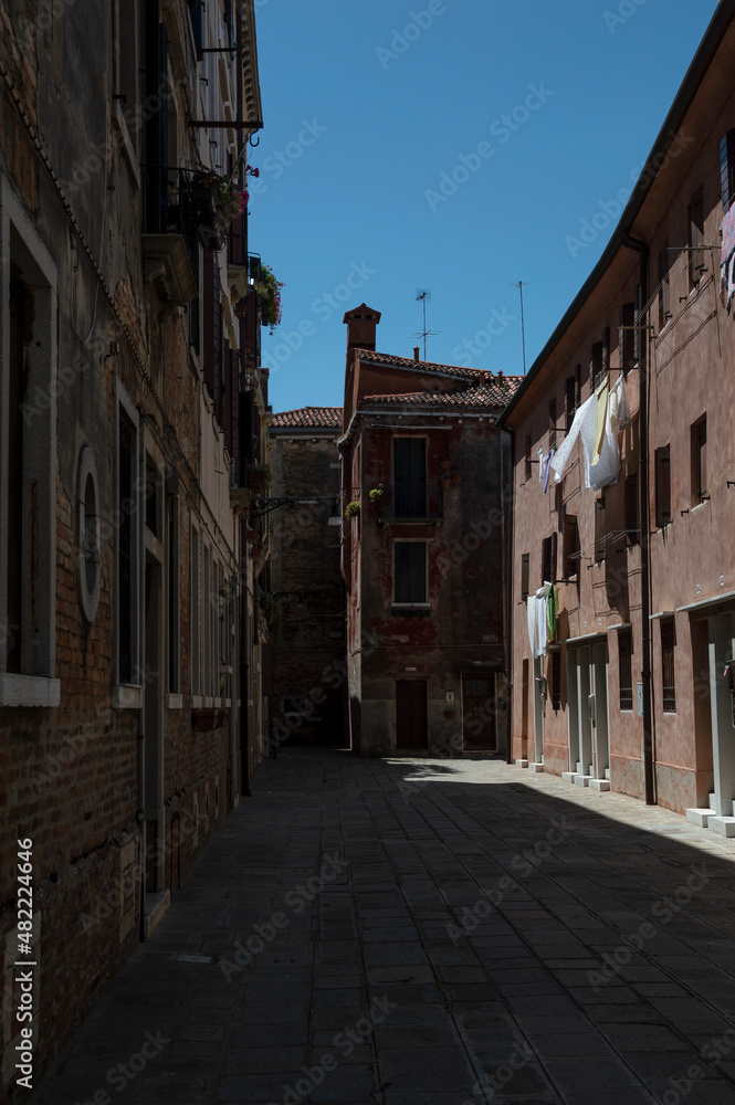 View of a secluded little street in Venice in summer