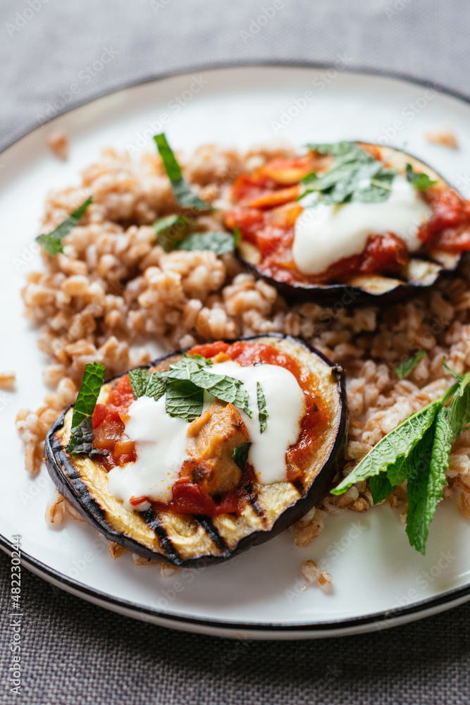 Grilled Eggplant on Farro with Tomato Sauce, Soy Yogurt and Mint Grilled Eggplant on Farro with Tomato Sauce, Soy Yogurt and Mint