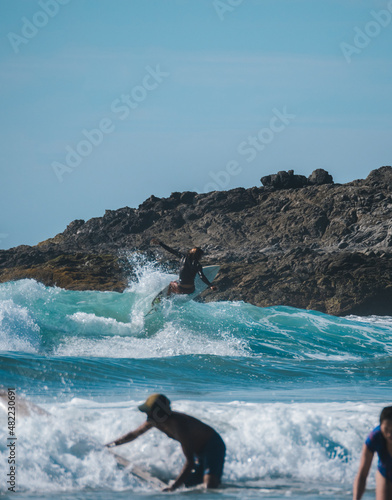 Photography Surfer on turquoise water in Cerritos Beach, Todos Santos, Baja California