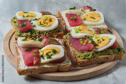 Sandwiches with smoked tuna, boiled egg and cottage cheese