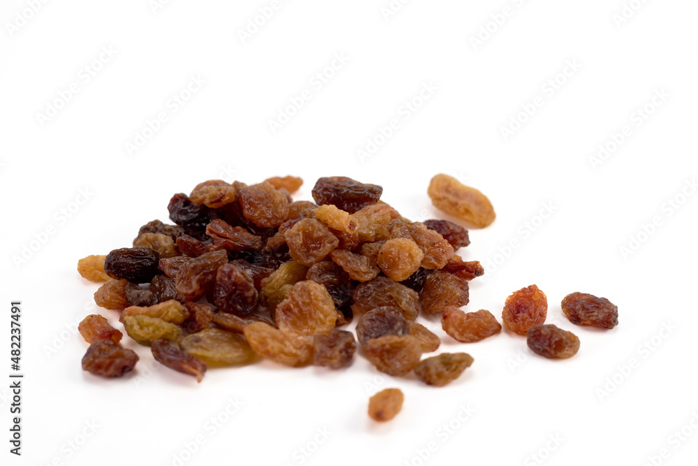 A pile of raisins isolated on a white background A pile of raisins isolated on a white background