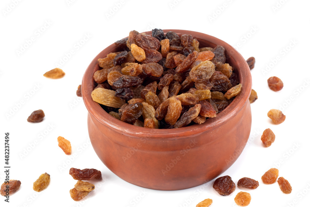 Sweet raisins or dried sweet grapes in a bowl isolated on a white background Sweet raisins or dried sweet grapes in a bowl isolated on a white background