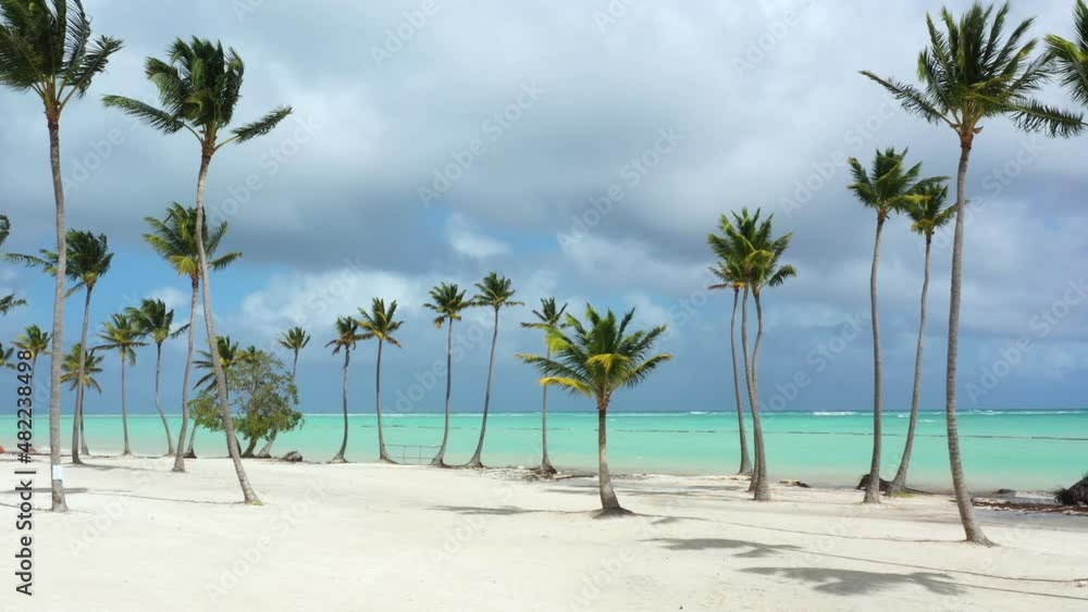 Dominicus beach at Bayahibe with Caribbean sea sandy seashore, lighthouse and pier. Dominican Republic. Aerial view from drone Dominicus beach at Bayahibe with Caribbean sea sandy seashore, lighthouse and pier. Dominican Republic. Aerial view from drone